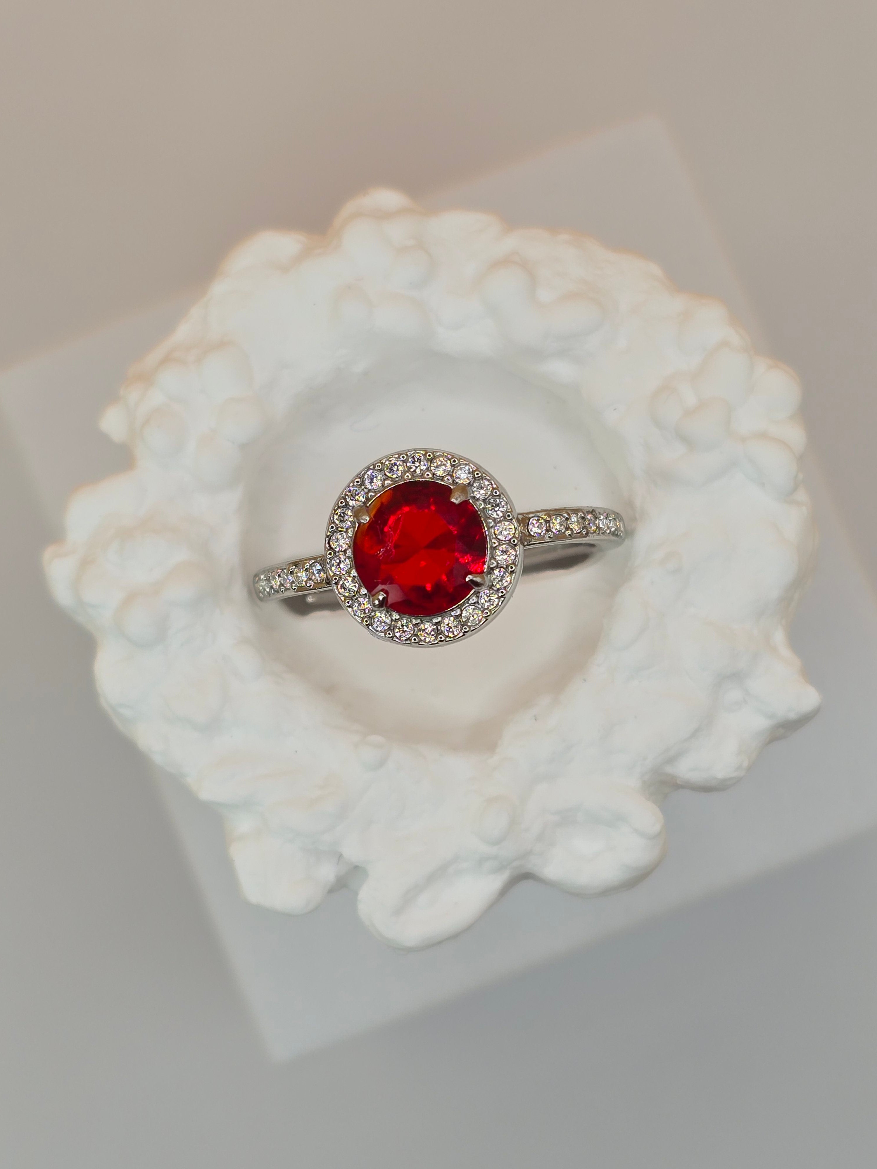 anello ninfa con zirconi rossi